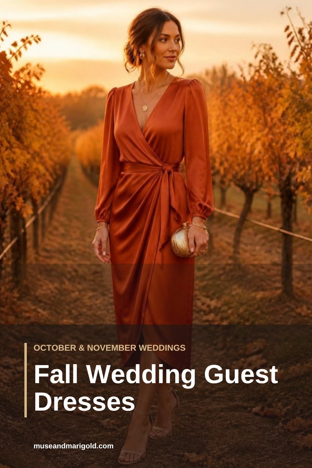 Woman in a rust satin wrap dress standing in an autumn vineyard at golden hour, a warm fall wedding guest look