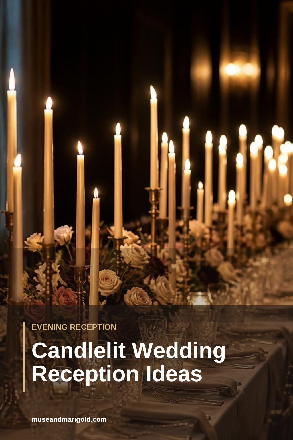 Candlelit wedding reception table lined with ivory taper candles and blush and burgundy roses