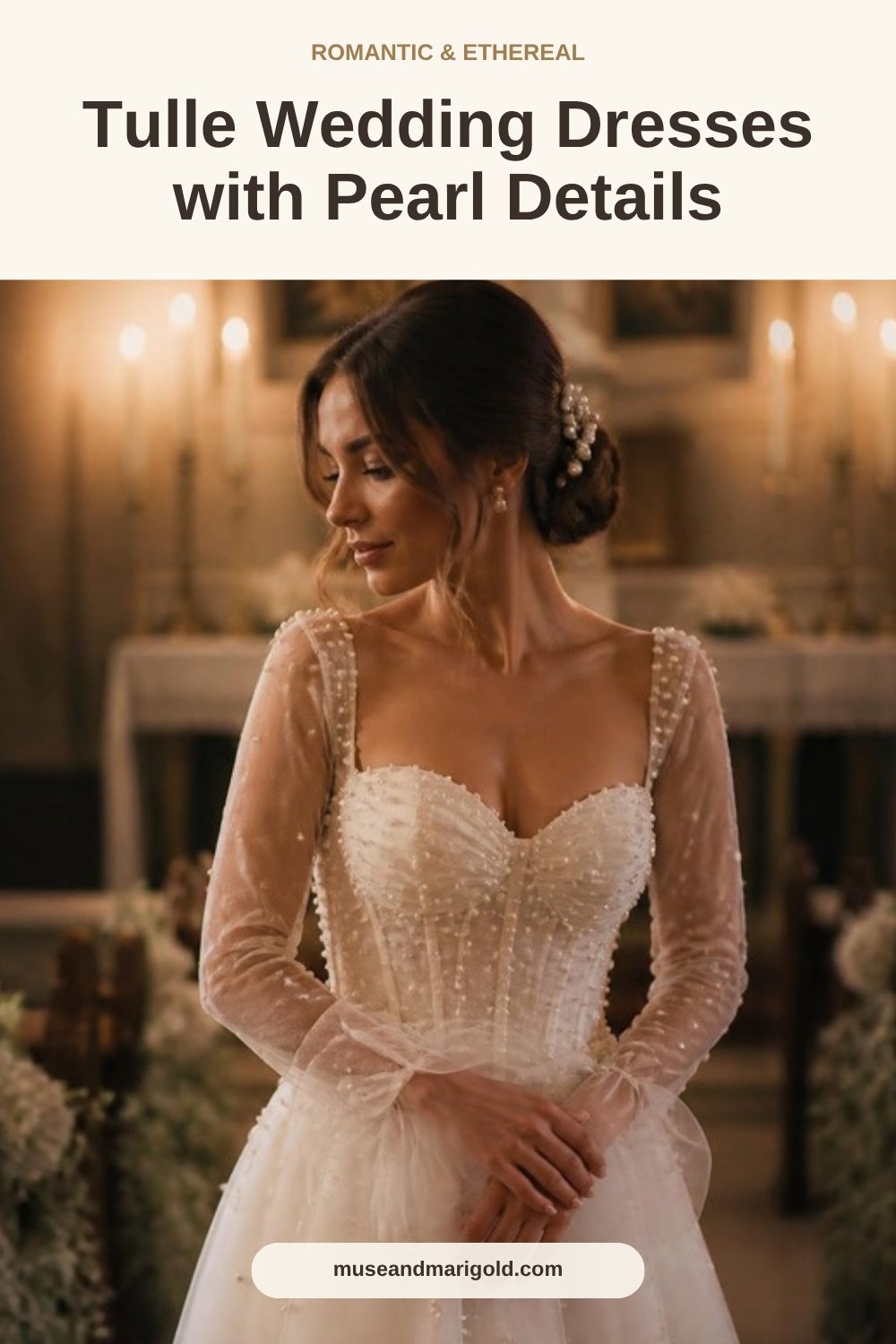 Bride in a sweetheart tulle wedding gown with sheer long sleeves scattered with pearls in a candlelit room with florals