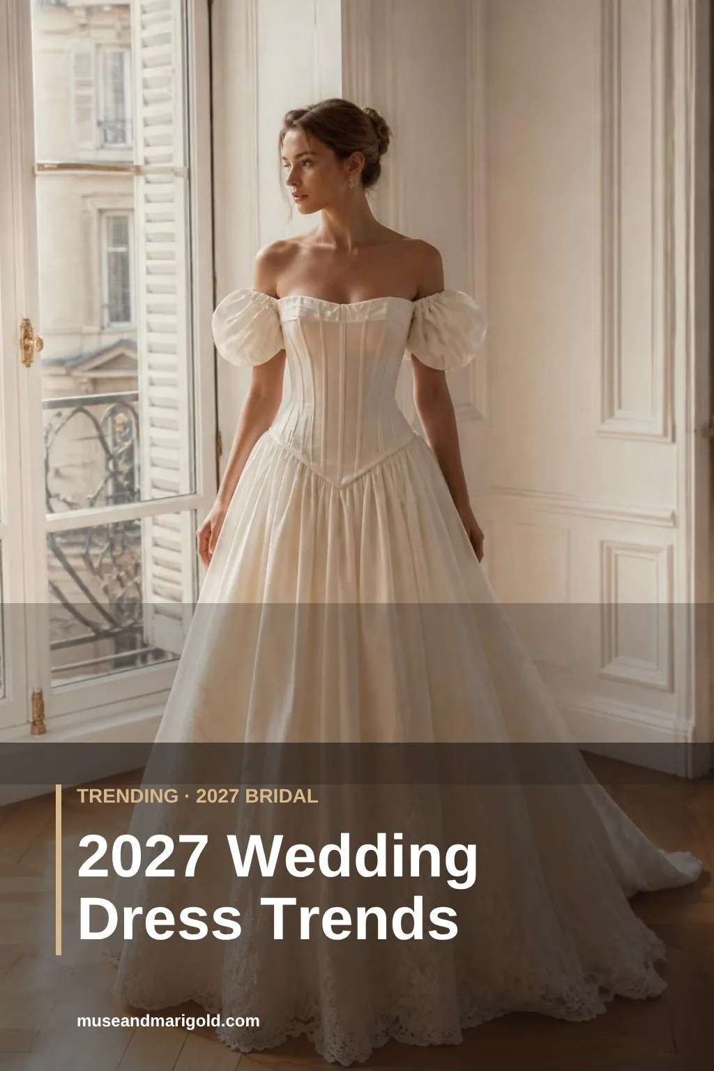 Bride in a drop-waist corset wedding gown with off-the-shoulder puff sleeves and a scalloped lace hem in a sunlit Paris salon